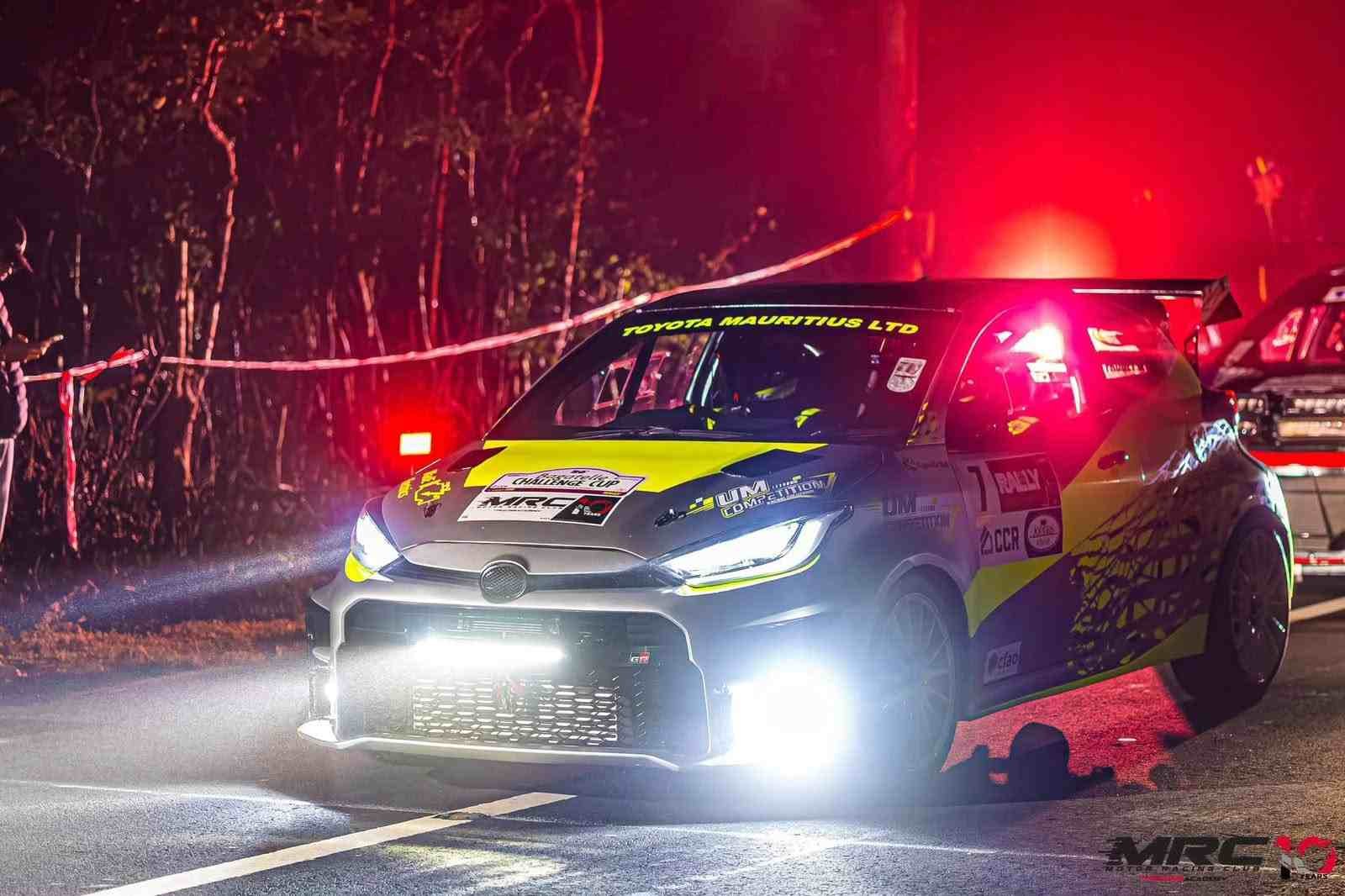 Sports car with customed headlights at night.
