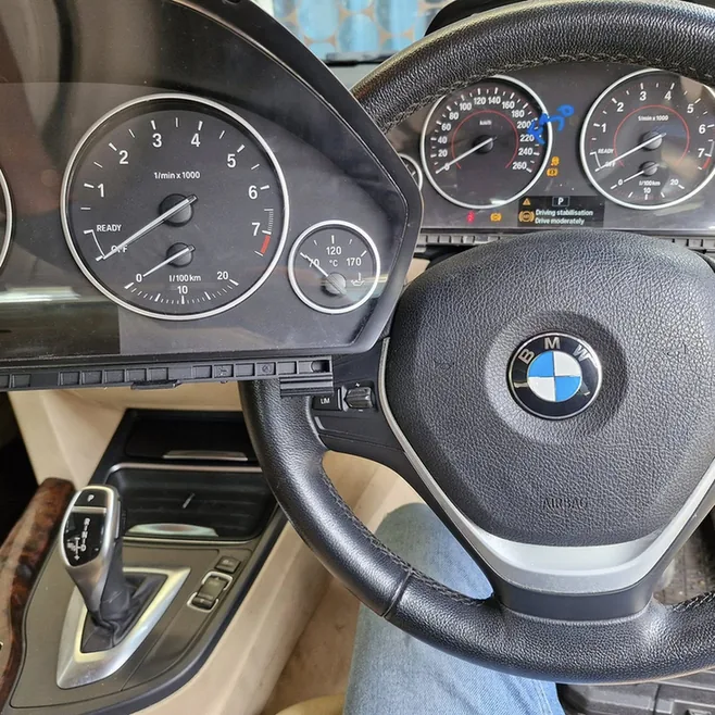 BMW instrument cluster removed for testing and repair.