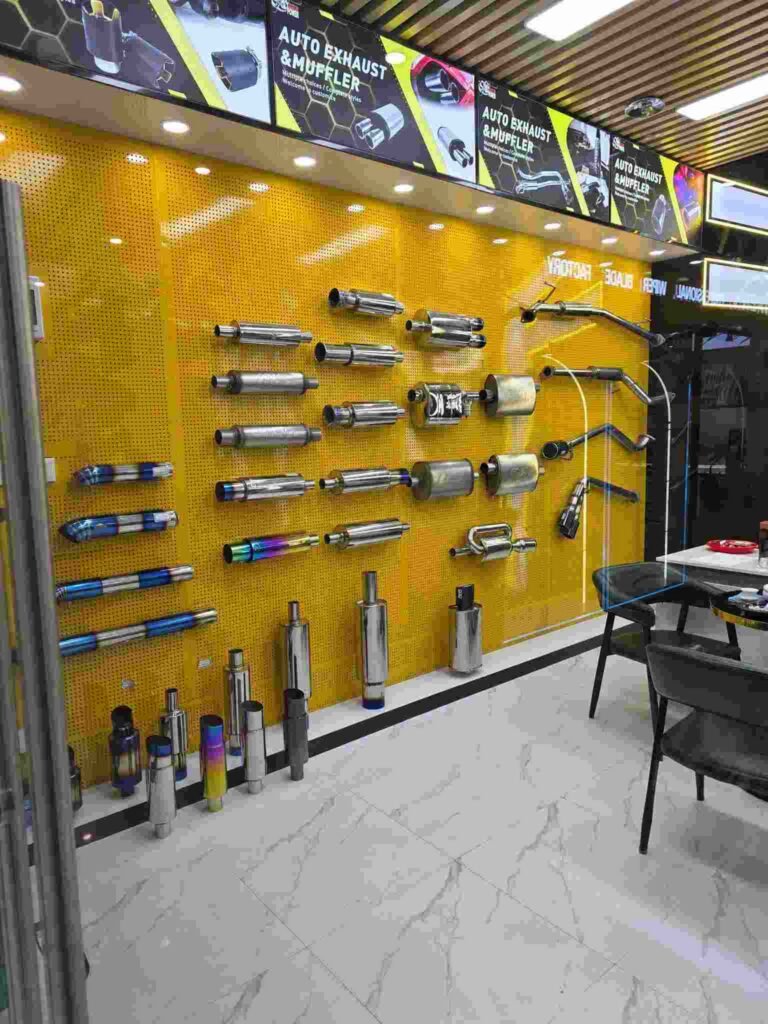 various car exhaust on a wall panel.