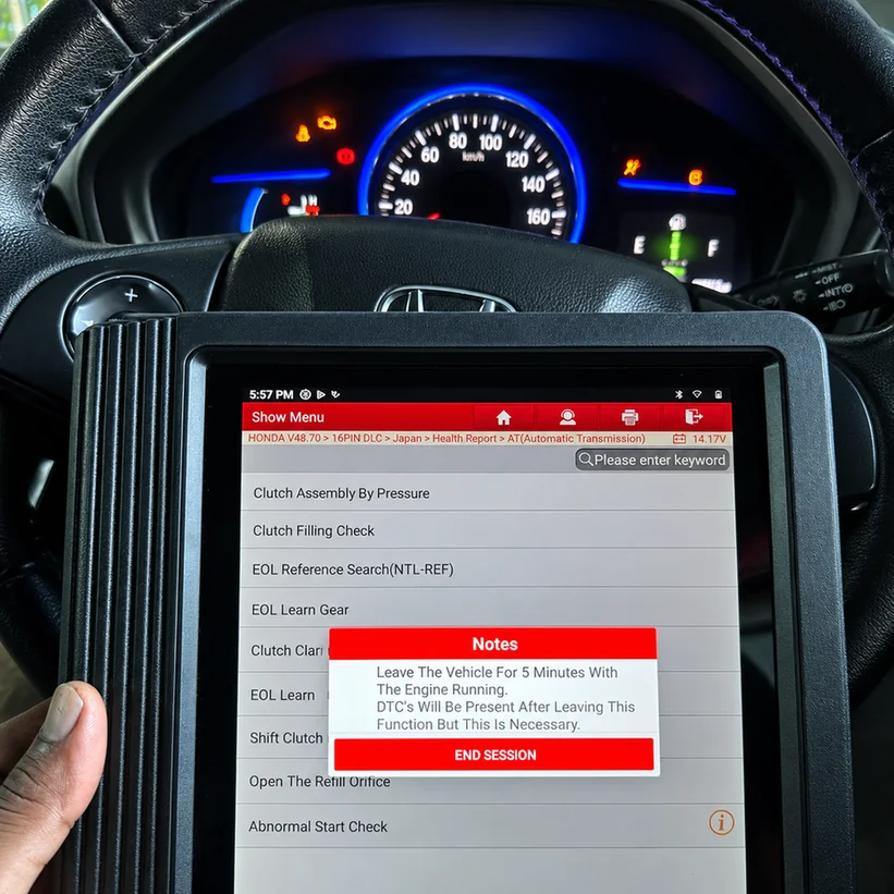 Diagnostic tablet displaying automatic transmission clutch checks inside a Honda.