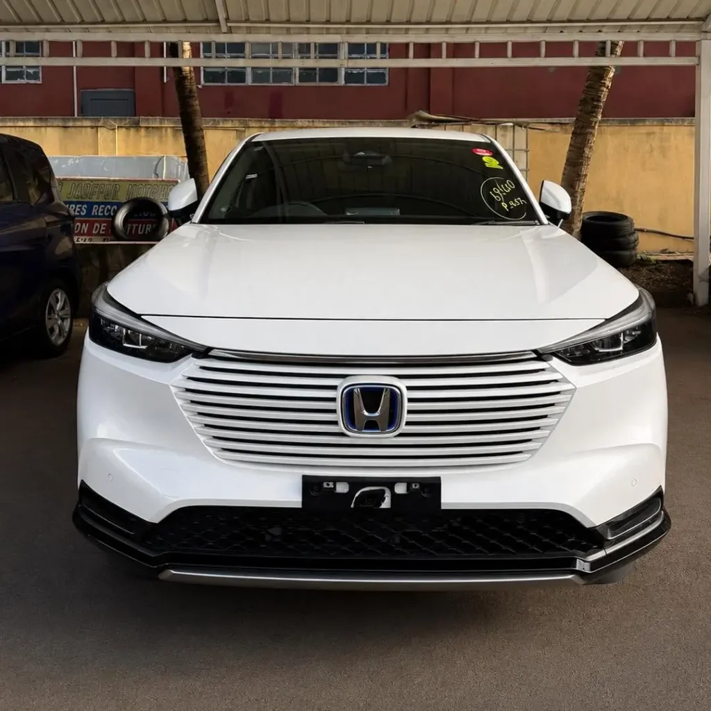 White Honda Vezel in a parking lot